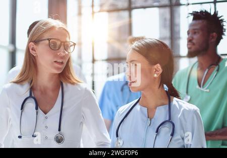 Portrait team professional doctors. The staff of the medical faculty. multinational people - doctor, nurse and surgeon. Stock Photo