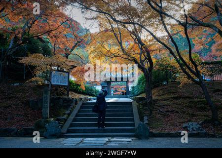 Old man taking photos at the Nanzenji Temple entrance Stock Photo