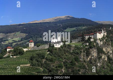 Klausen, chiusa, Italy - August 26.2022: Sabiona Monastery and the Church of Our Lady over the dolomites town Chiusa, Klausen, South Tyrol, Italy. Stock Photo