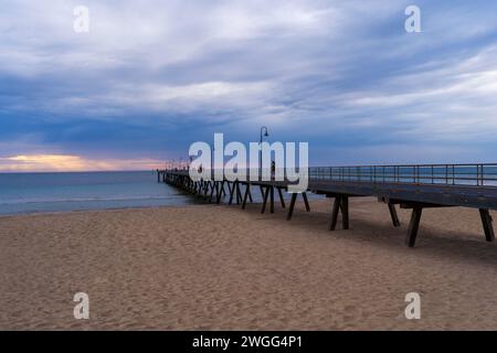 Glenelg Jetty at sunset in Adelaide, South Australia Stock Photo