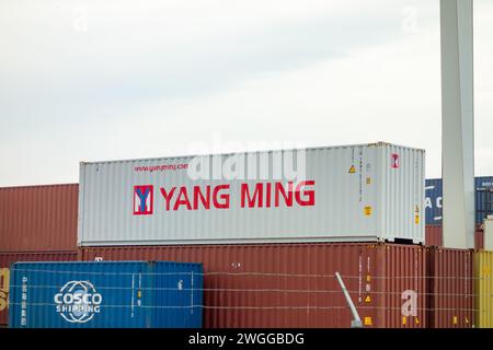 SENOV, CZECH REPUBLIC - MARCH 24, 2023: Yang Ming and Cosco Shipping containers at logistics centre Stock Photo