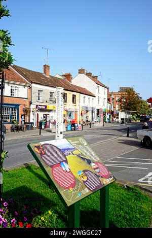 The Glastonbury Way information sign along Magdalene Street with town shops to the rear, Glastonbury, Somerset, UK. Stock Photo