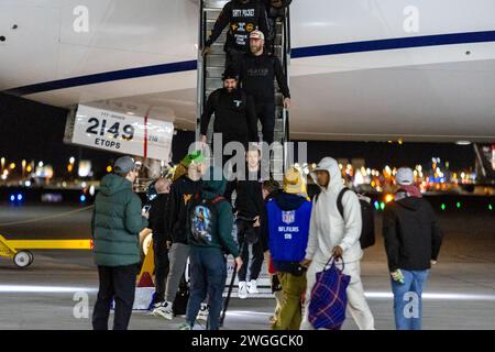Las Vegas, USA. 04th Feb, 2024. The San Francisco 49ers exit a plane during Super Bowl 58 team arrivals at the Harry Reid International Airport in Las Vegas, Nevada on February 4, 2024. (Travis P Ball/Sipa USA) Credit: Sipa USA/Alamy Live News Stock Photo
