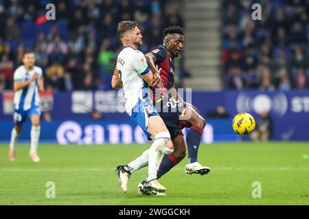 Barcelona, Spain. 04th, February 2024. Mohamed Bouldini (22) of Levante and Sergi Gomez (3) of Espanyol seen during the LaLiga 2 match between Espanyol and Levante at the Stage Front Stadium in Barcelona. (Photo credit: Gonzales Photo - Ainhoa Rodriguez). Stock Photo