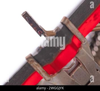 Broken metal typewriter, vintage object isolated, full frame Stock Photo