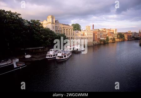 UK, Yorkshire, York, view from Lendal Bridge at boats moored on the river Ouse at sunset. Stock Photo
