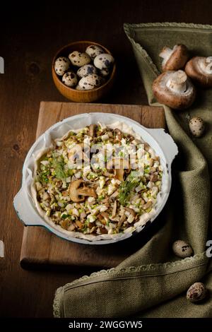 Pie with mushrooms and quail eggs Stock Photo