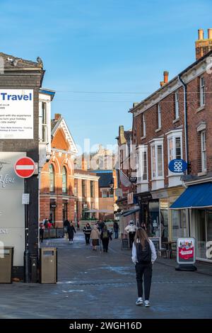 View along Sincil Street to Lincoln castle on top of hill, Lincoln City, Lincolnshire, England, UK Stock Photo