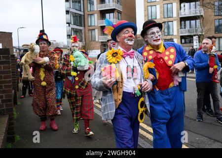 4th February 2024: On the first Sunday of February the annual clown service at All Saints Church, Haggerston, London takes place. Clowns of every age and nationality gather to remember the father of clowning Joseph Grimaldi. Stock Photo