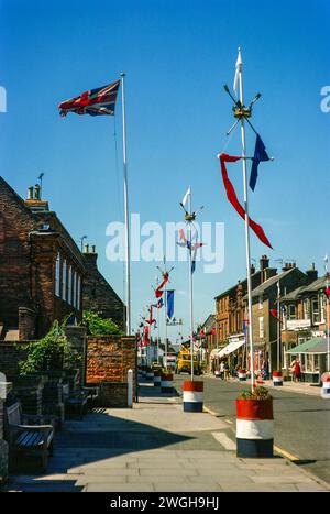 Flags and bunting decorating the street for Queen Elizabeth  Silver Jubilee celebrations 1977, Southwold, Suffolk, England, UK Stock Photo