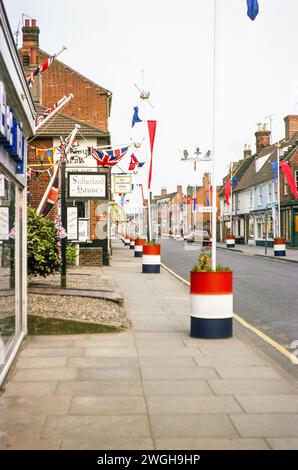 Flags and bunting decorating the street for Queen Elizabeth  Silver Jubilee celebrations 1977, Southwold, Suffolk, England, UK Stock Photo