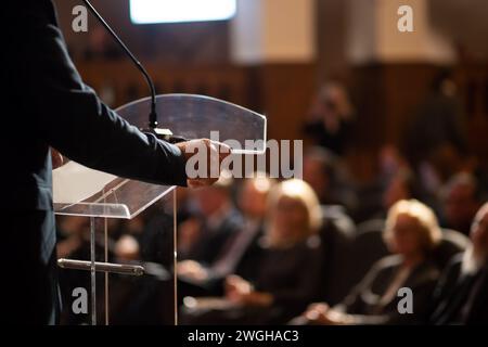 unrecognizable man having a speech in front of audience Stock Photo
