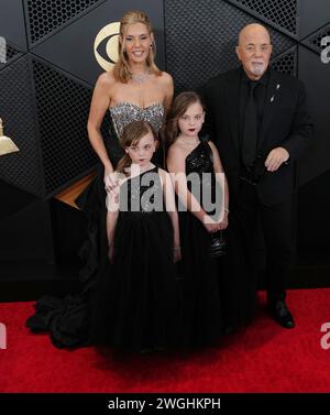 Los Angeles, USA. 04th Feb, 2024. Billy Joel and Family arrives at the 66th Annual Grammy Awards held at the Crypto.com Arena in Los Angeles, CA on Sunday, ?February 4, 2024. (Photo By Sthanlee B. Mirador/Sipa USA) Credit: Sipa USA/Alamy Live News Stock Photo