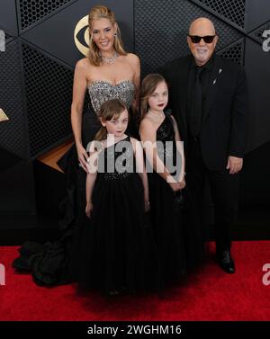 Los Angeles, USA. 04th Feb, 2024. Billy Joel and Family arrives at the 66th Annual Grammy Awards held at the Crypto.com Arena in Los Angeles, CA on Sunday, ?February 4, 2024. (Photo By Sthanlee B. Mirador/Sipa USA) Credit: Sipa USA/Alamy Live News Stock Photo