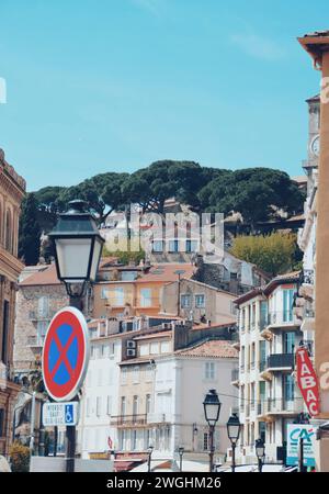 poster of the city of Cannes on top of a hill in Cannes in France, on April 18, 2019 Stock Photo