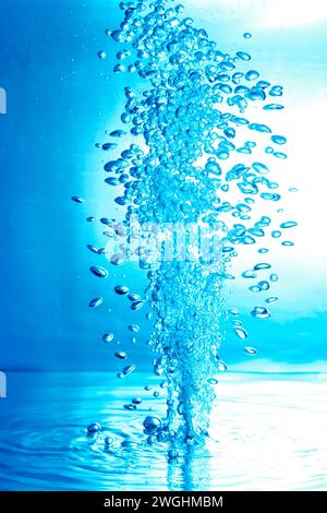 Many small air bubbles under water Stock Photo