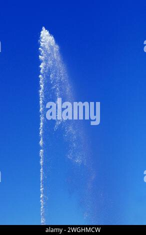 Water from a fountain in the blue sky Stock Photo