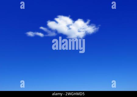 a white fair-weather cloud in the blue sky Stock Photo