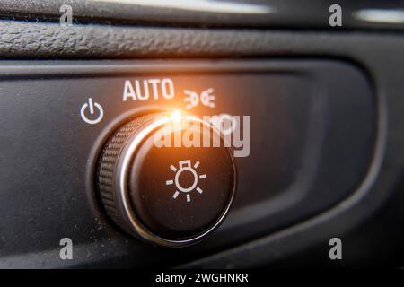 the button to turn on the automatic lighting. Stock Photo
