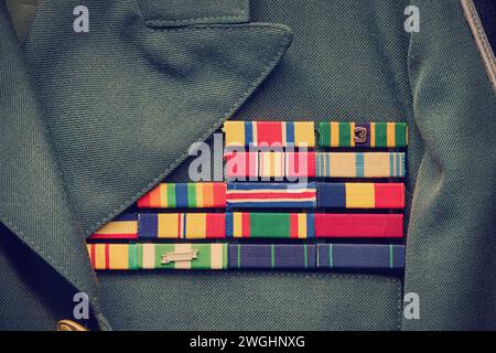 Ancient military insignia on an old army soldier uniform Stock Photo