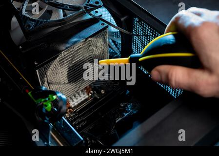 Close-up of a PC cooling system, a dirty radiator from a computer Stock Photo