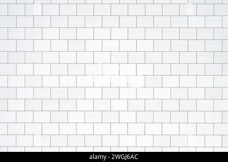 Background from a wall with rectangular white stone slabs Stock Photo
