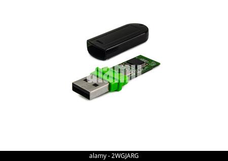 Close-up of disassembled USB flash drive on isolated background Stock Photo