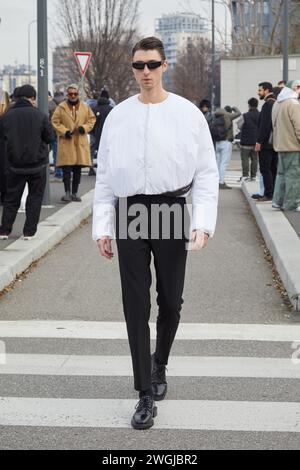 MILAN JANUARY 14 Man with jacket in green, yellow and white colors