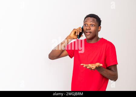 young black man making a phone call Stock Photo