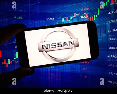 Konskie, Poland - February 04, 2024: Nissan Motor company logo displayed on mobile phone Stock Photo