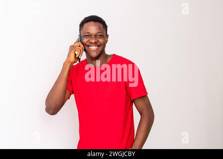 young black man making a phone call smiling Stock Photo