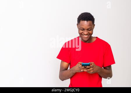 young black man using his smartphone Stock Photo
