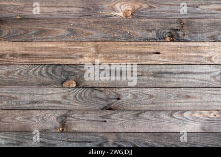 Texture background of wooden fence made with old boards. Stock Photo