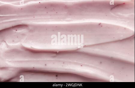 Smears of pink cosmetic cream. Beauty cream texture background. Stock Photo