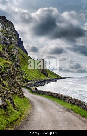 Dramatic coastal road along the B8035 on the edge of Loch Na Keal, Isle of Mull, Inner Hebrides, Scotland, UK Stock Photo