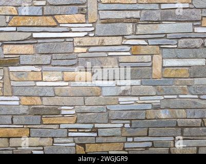 stone wall made out of irregular pieces Stock Photo