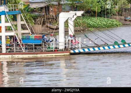 Ferry waiting by the river Mekong in Laos Stock Photo - Alamy