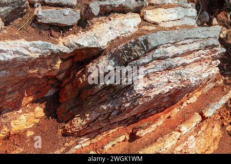 Natural rock or stone  surface as background texture close up. Structure of rough natural rock Stock Photo