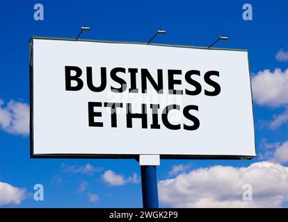 Business ethics symbol. Concept words Business ethics on beautiful white billboard. Beautiful blue sky white cloud background. Business ethics concept Stock Photo
