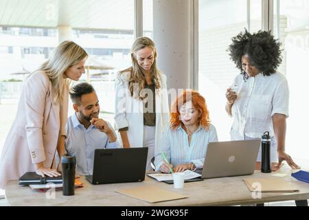 Multiethnic business team working together in the office. Business concept. Stock Photo