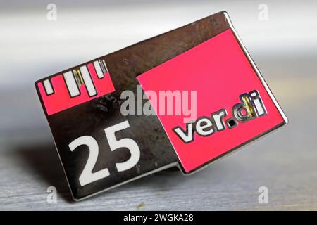 Viersen, Germany - January 9. 2024: Closeup of Verdi union pin for 25 years of loyal membership Stock Photo