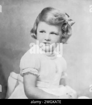 Portrait of the young Princess Alexandra of Kent at the age of 4, taken in 1940. This photograph captures the early childhood of Alexandra, born on December 25, 1936, a cousin of Queen Elizabeth II. At this time, Alexandra was growing up during a tumultuous period marked by World War II. Stock Photo