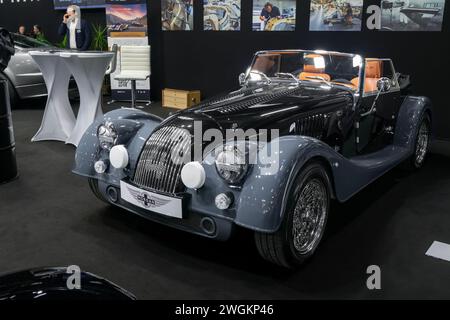 Paris, France - Rétromobile 2024. Focus on a Metallic Black and Dark Grey Morgan PlusFour. Stock Photo