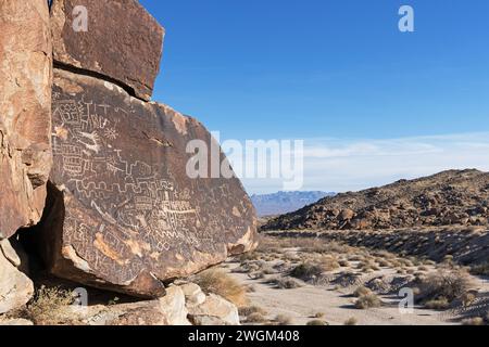 petroglyphs on a boulder overlooking Grapevine Canyon in Avi Kwa Ame National Monument in Southern Nevada Stock Photo