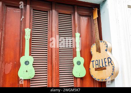 Merida Mexico,Barrio de Santiago Centro,Calle 59,outside exterior entrance,guitar music workshop studio lessons,guitar lessons,Mexican Hispanic Latin Stock Photo