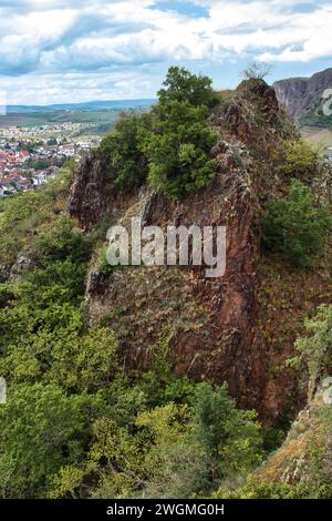 Rock with green plants on Rotenfels, cliffs above Bad Munster, Germany. Stock Photo
