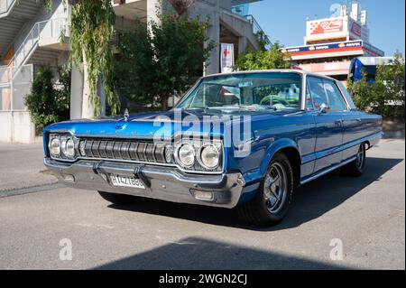 Front view of the immense blue classic American car Dodge Polara. Stock Photo