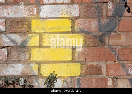 Painted yellow bricks Stock Photo