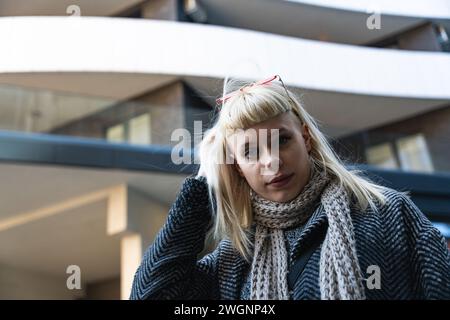POV Young hippie smiling woman not knowing is it photographing or recording her with camera. Funny moment girlfriend and creative boyfriend having fun Stock Photo