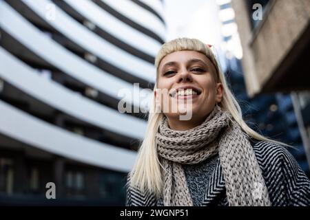 POV Young hippie smiling woman not knowing is it photographing or recording her with camera. Funny moment girlfriend and creative boyfriend having fun Stock Photo